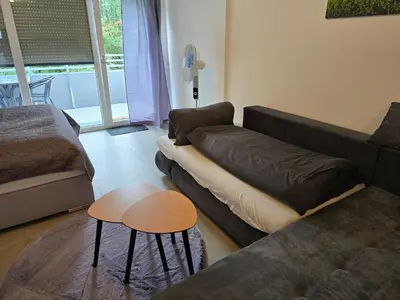 Ein Sitzbereich in der Unterkunft Modernes Apartment in guter Lage Deluxe