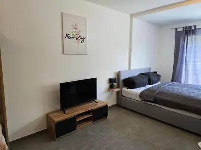 Ein Bett oder Betten in einem Zimmer der Unterkunft Modernes Apartment in guter Lage Deluxe