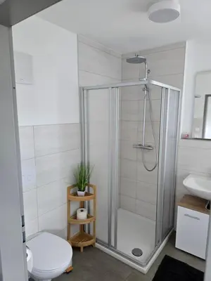 Ein Badezimmer in der Unterkunft Modernes Apartment in guter Lage Deluxe