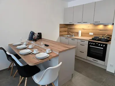 Küche/Küchenzeile in der Unterkunft Modernes Apartment in guter Lage Deluxe