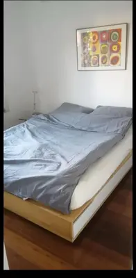 Ein Bett oder Betten in einem Zimmer der Unterkunft Quiet Retreat with Balcony in the Centre of Munich