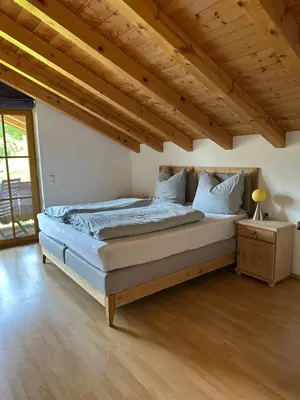 Ein Bett oder Betten in einem Zimmer der Unterkunft Ferienwohnung Obstgartenblick