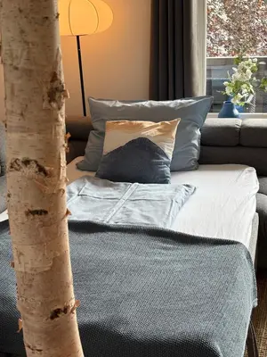 Ein Bett oder Betten in einem Zimmer der Unterkunft Rosels Mountain Lodge-Pool, Sauna & Kaiserblick-Balkon Ferienwohnung in Oberaudorf Bayern