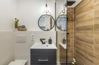 Ein Badezimmer in der Unterkunft Rosels Mountain Lodge-Pool, Sauna & Kaiserblick-Balkon Ferienwohnung in Oberaudorf Bayern
