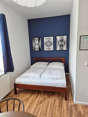 Ein Bett oder Betten in einem Zimmer der Unterkunft Studio 1 - Apartments am Schloss