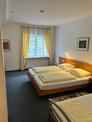 Ein Bett oder Betten in einem Zimmer der Unterkunft Gästezimmer im Trenner