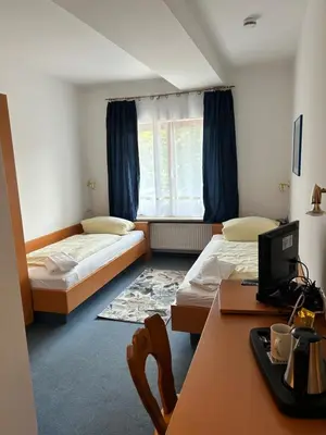 Ein Bett oder Betten in einem Zimmer der Unterkunft Gästezimmer im Trenner