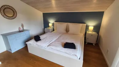 Ein Bett oder Betten in einem Zimmer der Unterkunft Ferienhaus Fringaluna