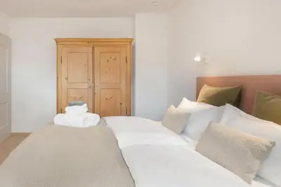 Ein Bett oder Betten in einem Zimmer der Unterkunft Design-Apartment am Chiemsee