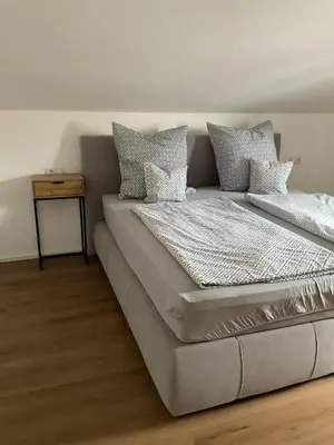 Ein Bett oder Betten in einem Zimmer der Unterkunft Sonnenaufgang