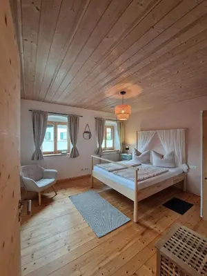 Ein Bett oder Betten in einem Zimmer der Unterkunft Ferienwohnung Dorfglück