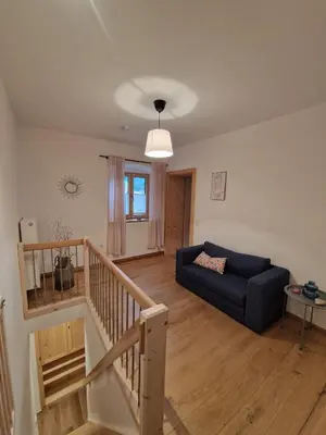 Ein Sitzbereich in der Unterkunft Ferienwohnung Dorfglück
