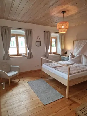 Ein Bett oder Betten in einem Zimmer der Unterkunft Ferienwohnung Dorfglück