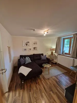 Ein Sitzbereich in der Unterkunft Ferienwohnung Dorfglück