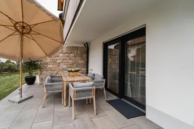 Ein Patio oder anderer Außenbereich in der Unterkunft Bay 12° Boutique Apartment am Chiemsee
