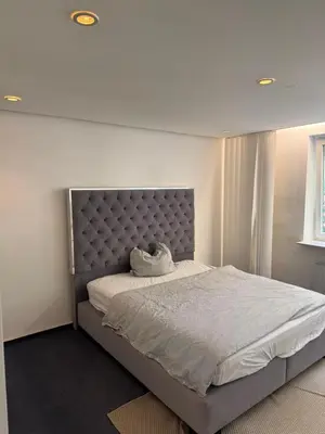 Ein Bett oder Betten in einem Zimmer der Unterkunft Quiet Family Apartment - 10 min to Center & Oktoberfest - Free Parking - near Nymphenburg Palace & Botanical Garden