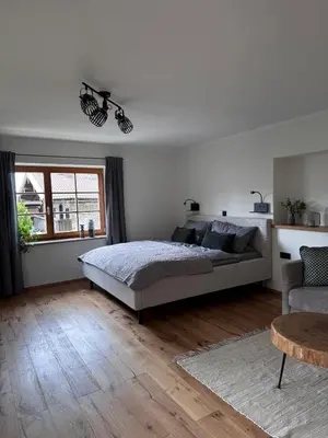 Ein Bett oder Betten in einem Zimmer der Unterkunft Ferienwohnung Antretter