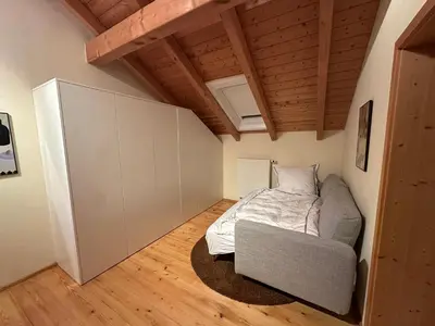 Ein Bett oder Betten in einem Zimmer der Unterkunft Moderne Wohnung im Grünen