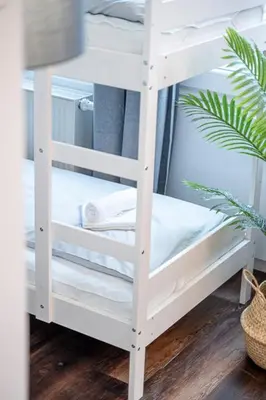 Ein Bett oder Betten in einem Zimmer der Unterkunft 1 Modernes City-Studio für 6 Bogenhausen Nähe Messe