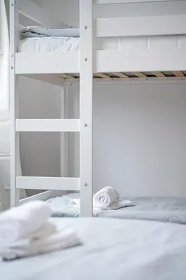 Ein Bett oder Betten in einem Zimmer der Unterkunft 2 Modern city studio for 6 Bogenhausen near Messe
