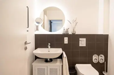 Ein Badezimmer in der Unterkunft 2 Modern city studio for 6 Bogenhausen near Messe