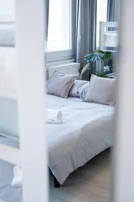 Ein Bett oder Betten in einem Zimmer der Unterkunft 4 Modern city studio for 7 Bogenhausen near Messe Munich