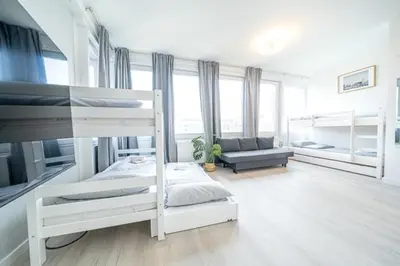 Ein Bett oder Betten in einem Zimmer der Unterkunft 4 Modern city studio for 7 Bogenhausen near Messe Munich
