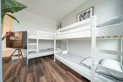 Ein Bett oder Betten in einem Zimmer der Unterkunft 5 Modern city studio for 6 Bogenhausen near Messe Munich