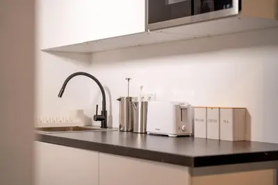 Küche/Küchenzeile in der Unterkunft 5 Modern city studio for 6 Bogenhausen near Messe Munich