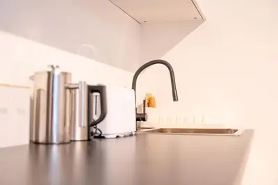 Kaffee-/Teezubehör in der Unterkunft 7 Modern city studio for 7 Bogenhausen near Messe Munich