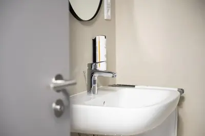 Ein Badezimmer in der Unterkunft Homaris Apartments Therese