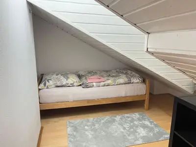 Ein Bett oder Betten in einem Zimmer der Unterkunft Grosses Haus bei München mit 4 Schlafzimmern für bis zu 10 Personen
