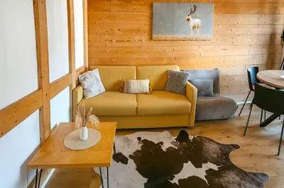 Ein Sitzbereich in der Unterkunft Apartmenthaus Der Johanneshof - tolle Lage nah am See