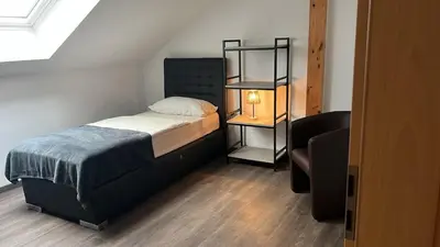 Ein Bett oder Betten in einem Zimmer der Unterkunft Schöne Ferienwohnung