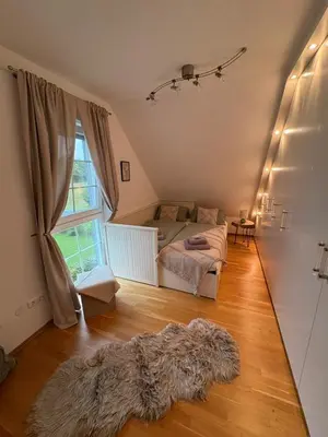 Ein Bett oder Betten in einem Zimmer der Unterkunft Charming, cozy house near Munich