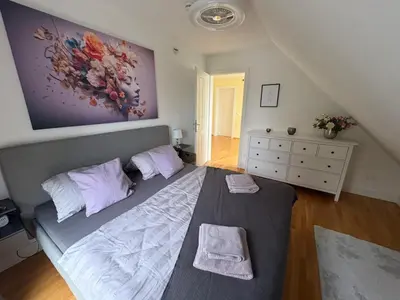 Ein Bett oder Betten in einem Zimmer der Unterkunft Charming, cozy house near Munich