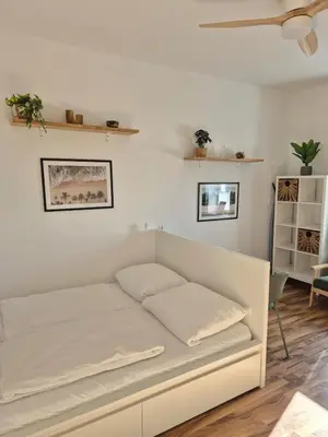 Ein Bett oder Betten in einem Zimmer der Unterkunft Studio 2 - Apartments am Schloss
