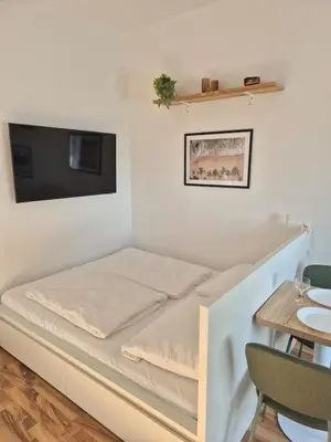 Ein Bett oder Betten in einem Zimmer der Unterkunft Studio 2 - Apartments am Schloss