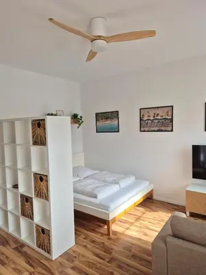 Ein Bett oder Betten in einem Zimmer der Unterkunft Studio 3 - Apartments am Schloss