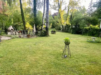 Ein Garten an der Unterkunft Fun Franz for 6 Persons