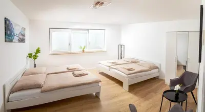 Ein Bett oder Betten in einem Zimmer der Unterkunft Stylish city apartment, close to the English Garden