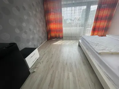 Ein Bett oder Betten in einem Zimmer der Unterkunft Pension De Lux Rain