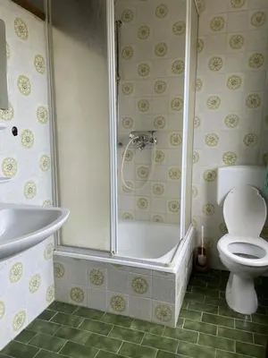 Ein Badezimmer in der Unterkunft Pension De Lux Rain