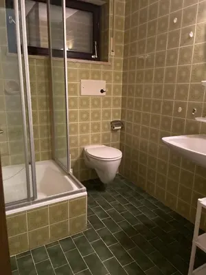 Ein Badezimmer in der Unterkunft Pension De Lux Rain