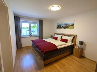 Ein Bett oder Betten in einem Zimmer der Unterkunft Ferienwohnung am Krebsbach