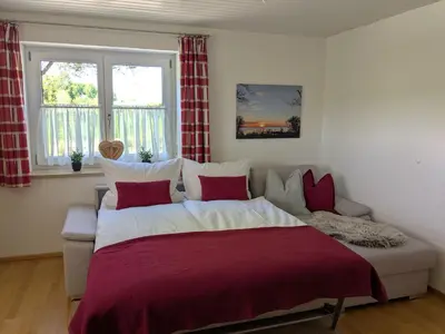 Ein Bett oder Betten in einem Zimmer der Unterkunft Ferienwohnung am Krebsbach