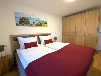 Ein Bett oder Betten in einem Zimmer der Unterkunft Ferienwohnung am Krebsbach