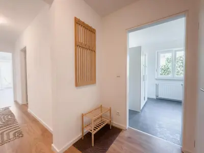 Ein Bett oder Betten in einem Zimmer der Unterkunft Skyrise Apartments in Bad Wörishofen - zentral & modern