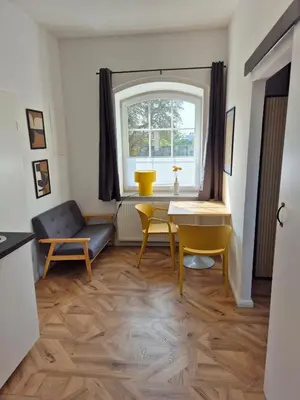 Ein Sitzbereich in der Unterkunft 2-Zimmer Wohnung 3 - Apartments am Schloss