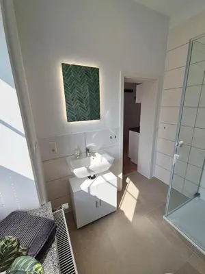 Ein Badezimmer in der Unterkunft 2-Zimmer Wohnung 3 - Apartments am Schloss